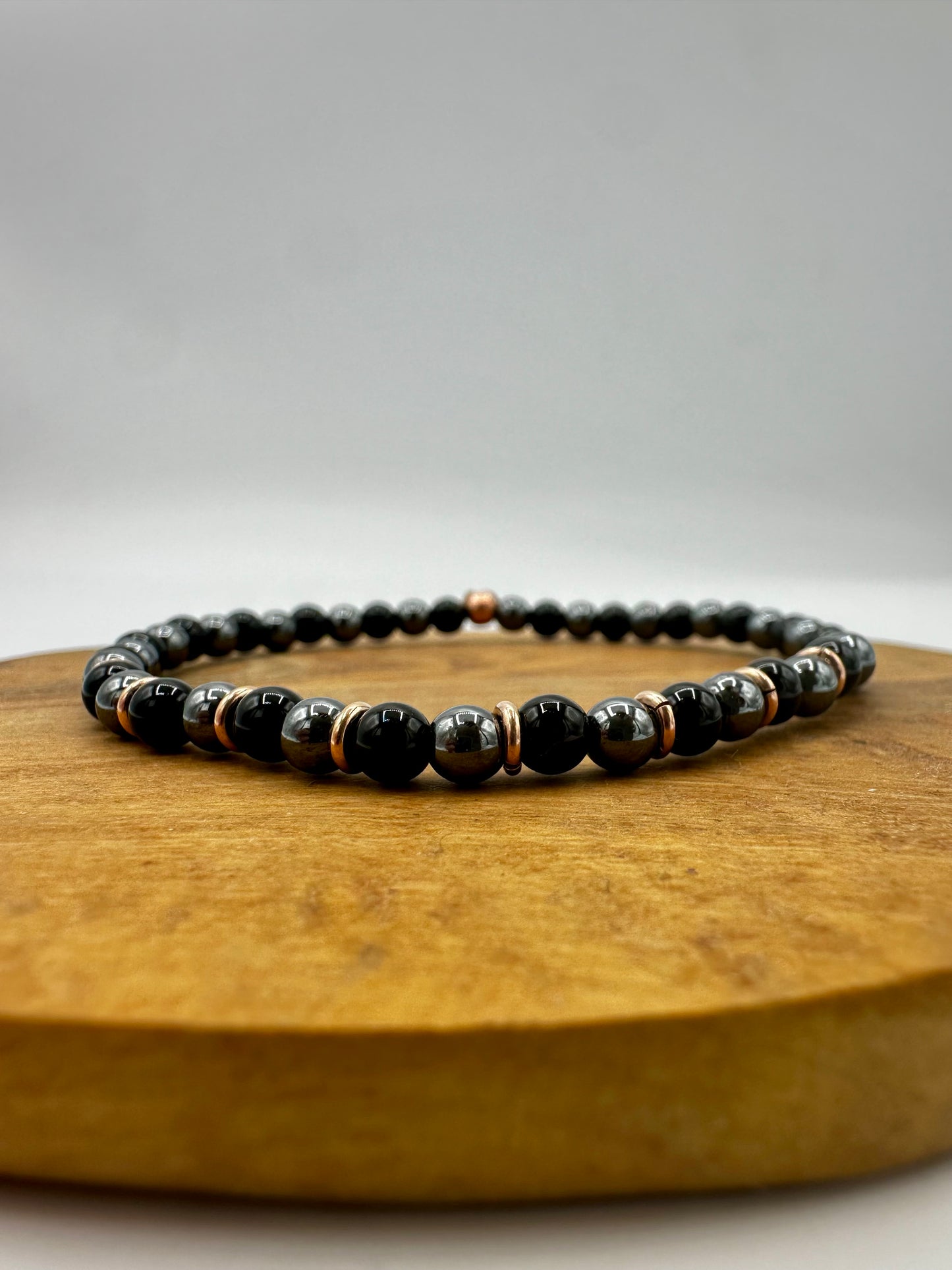 BRACCIALE ELASTICO CON EMATITE ED ONICE NERA