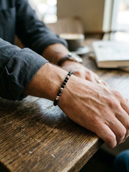 BRACCIALE DA UOMO CON CRISTALLI NERI E ARGENTO SFACCETTATI