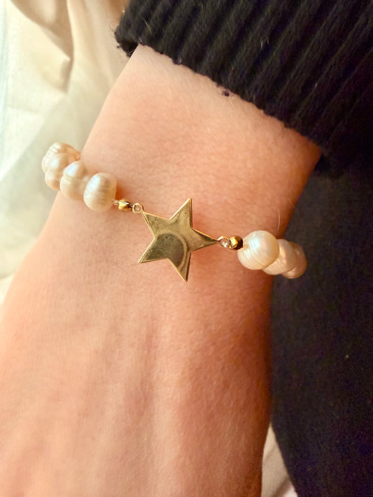 BRACCIALE PERLE BIANCHE CON STELLA IN LINEA