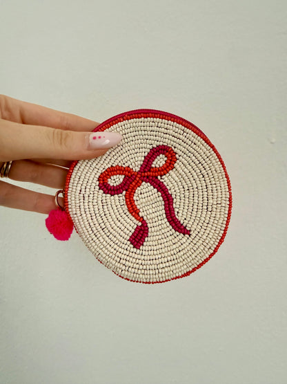 PORTAFOGLIO PICCOLO TONDO CON FIOCCO BIANCO-FUCSIA-ARANCIONE CALDO