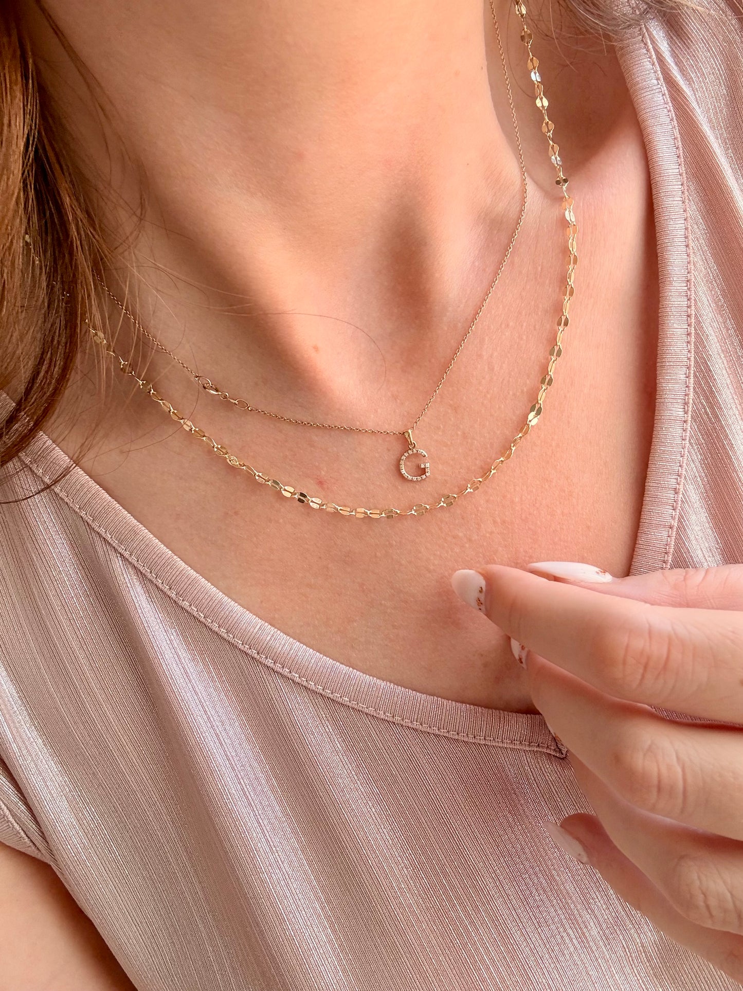 COLLANA CON OVALI PIATTI LAVORATI