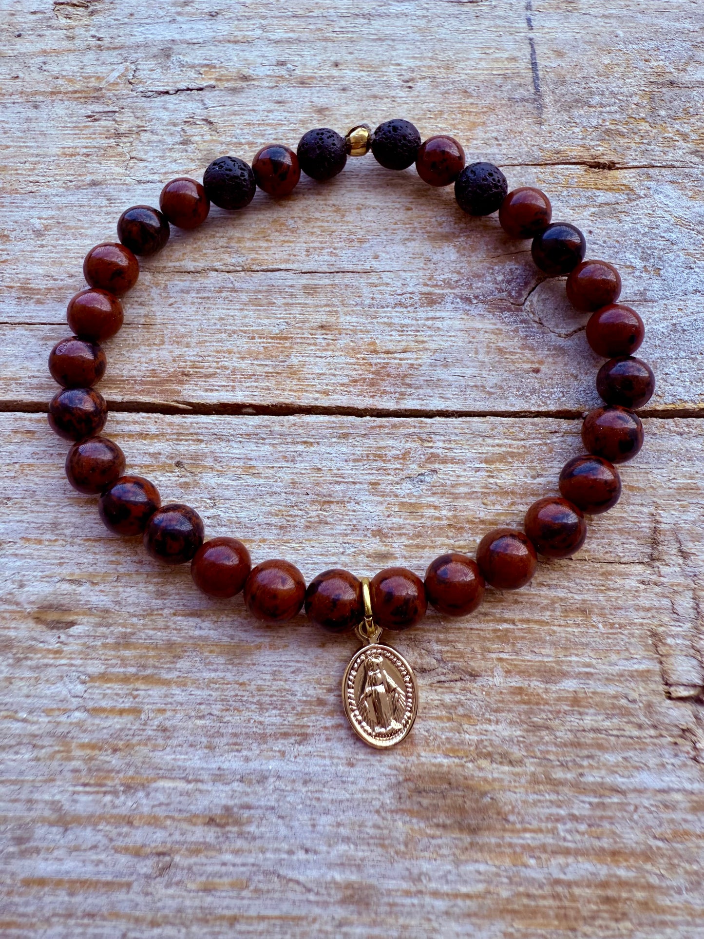 BRACCIALE ELASTICO OSSIDIANA MOGANO, LAVA NERA E MADONNINA