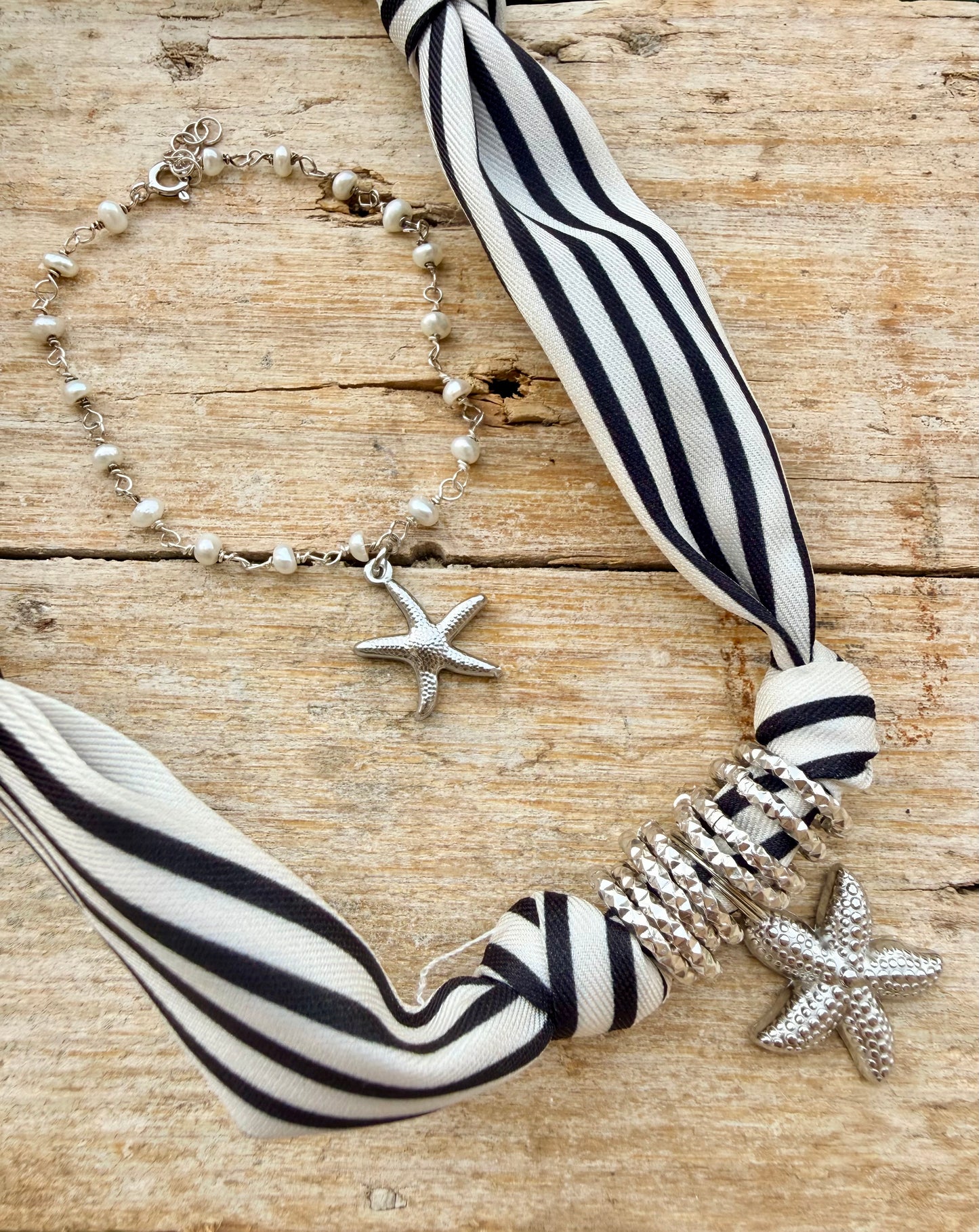 BRACCIALE PERLE E STELLA MARINA