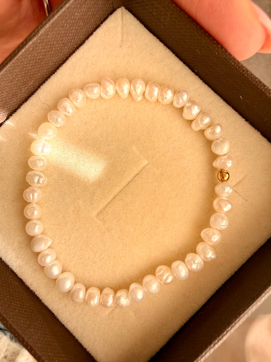 BRACCIALE PERLE TONDE IRREGOLARI DA 0,5mm