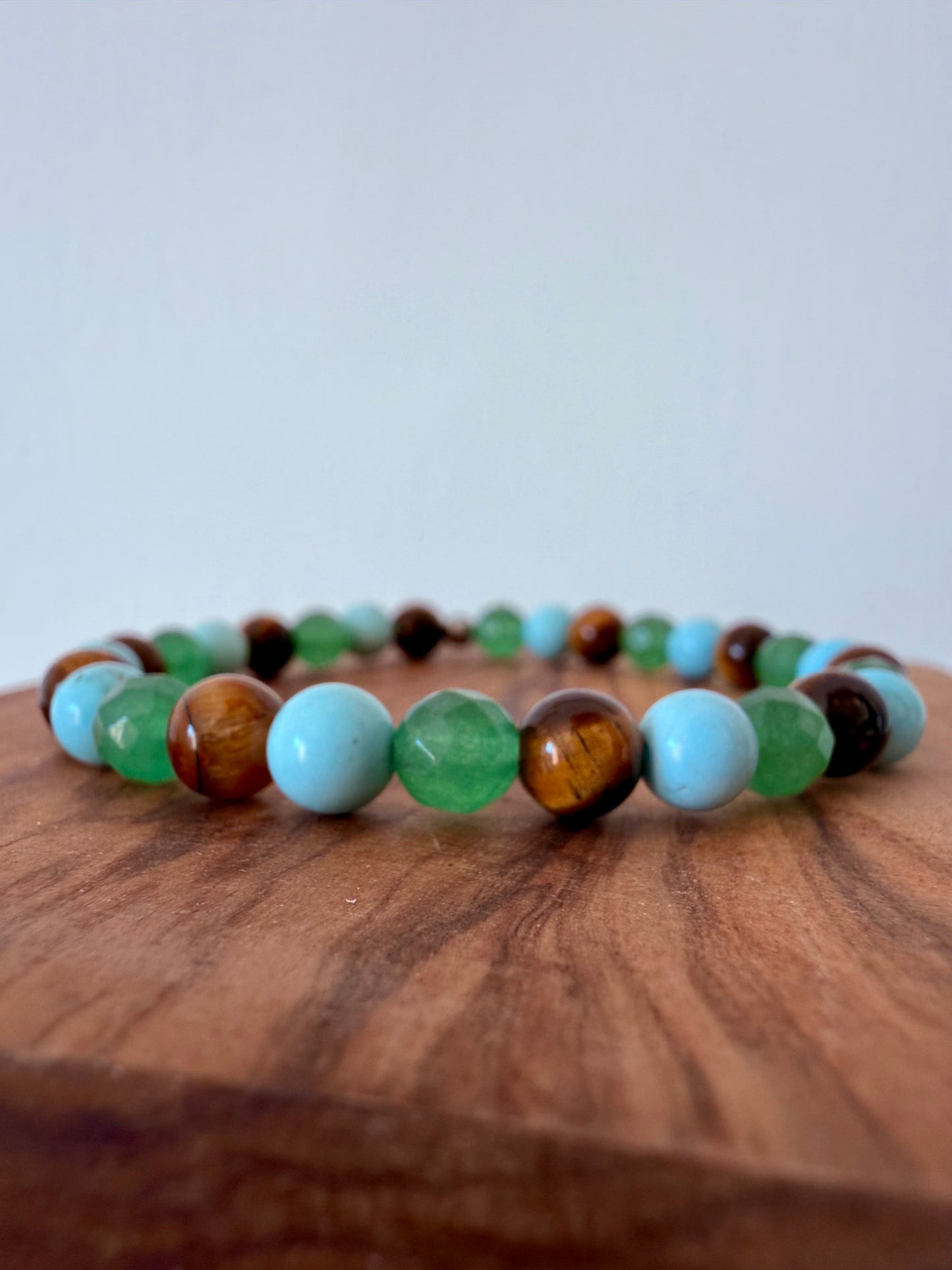 BRACCIALE ELASTICO CON PERLE DI AVVENTURINA, PASTA DI TURCHESE ED OCCHIO DI TIGRE