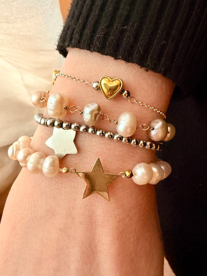 BRACCIALE PERLE BIANCHE CON STELLA IN LINEA