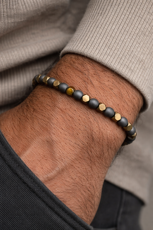 BRACCIALE ELASTICO CON EMATITE MATTE E DORATA