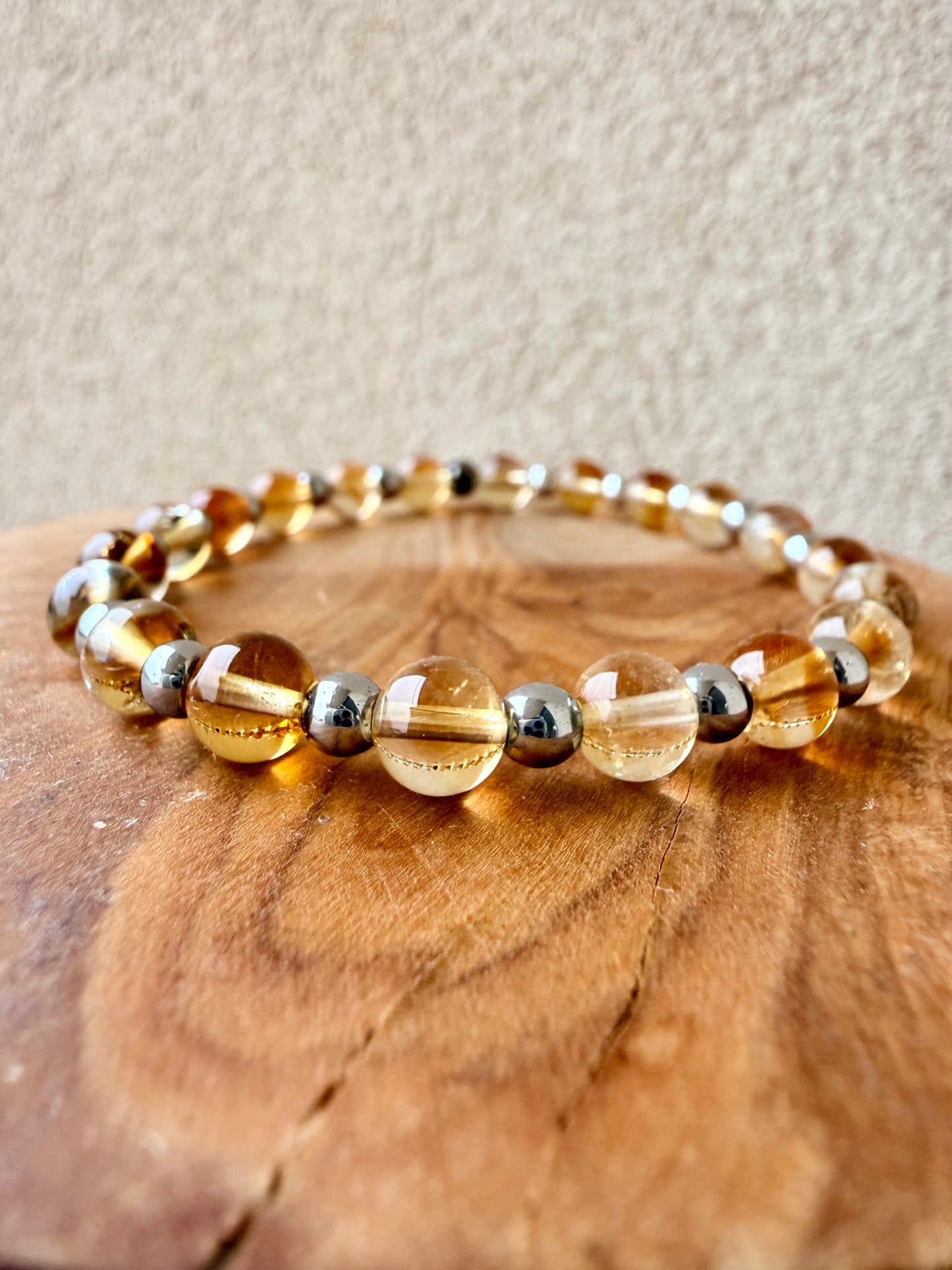 BRACCIALE ELASTICO CON QUARZO CITRINO SCURO ED EMATITE