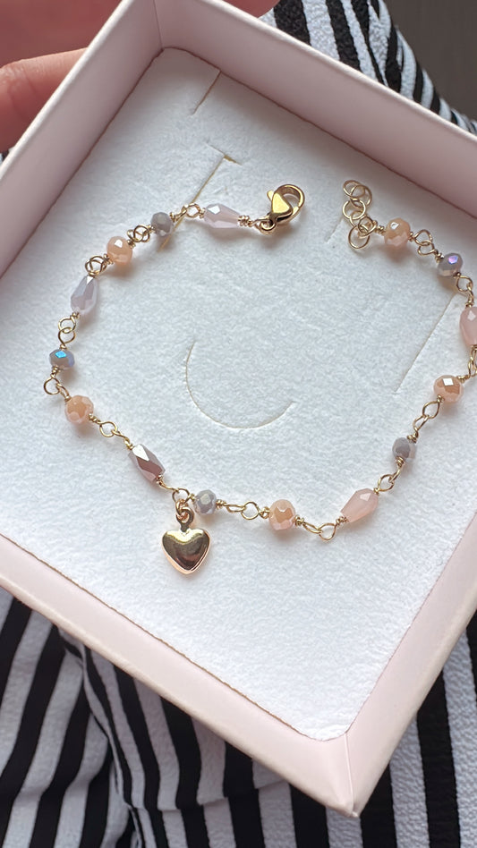 BRACCIALE ROSARIO CON CRISTALLI BEIGE, GRIGIO, ROSATO E CUORICINO DORATO