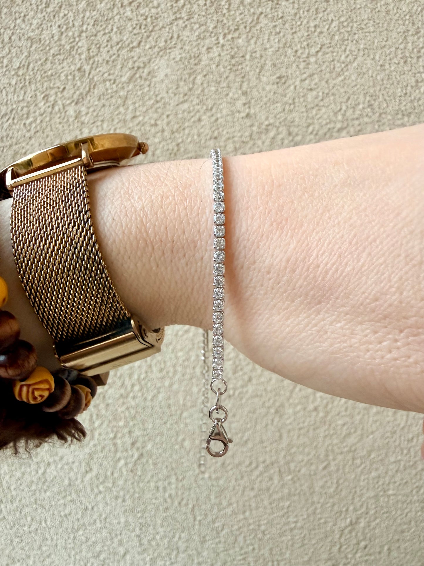 BRACCIALE TENNIS CON ZIRCONI BIANCHI 2 mm IN ARGENTO RODIATO CON CHIUSURA A MOSCHETTONE