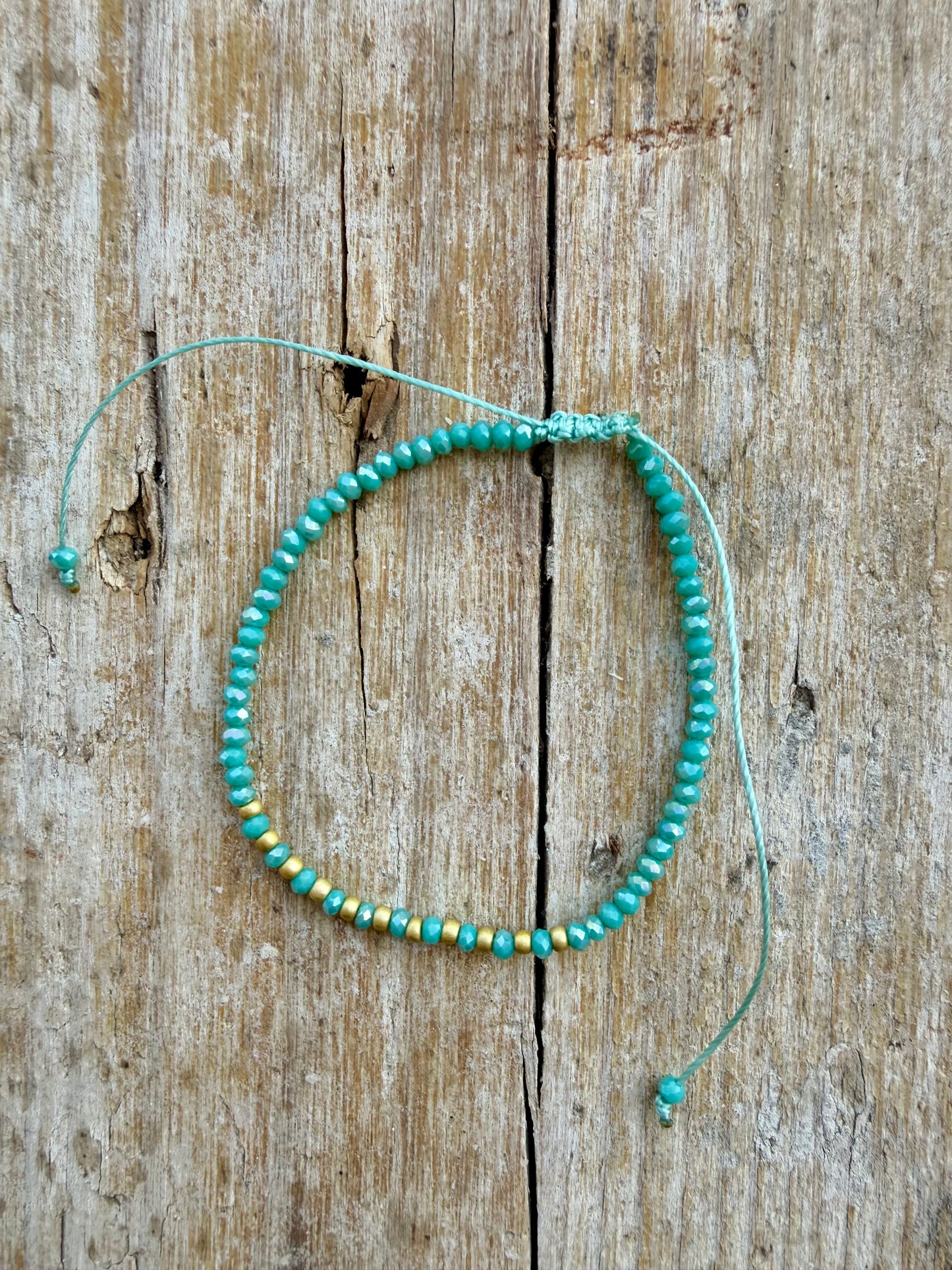 BRACCIALE CORDINO REGOLABILE MICRO CRISTALLI TURCHESI ALTERNATI A RONDELLE ORO