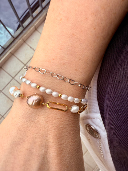 BRACCIALE ALTERNATO DA PERLE ROSA LILLA BIANCHE ED ELEMENTO OVALE PIATTO