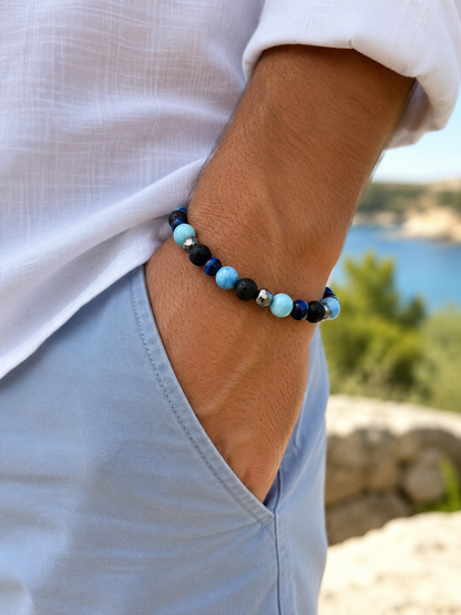 BRACCIALE ELASTICO CON PIETRA DI LAVA, EMATITE, QUARZO LARIMAR E SODALITE