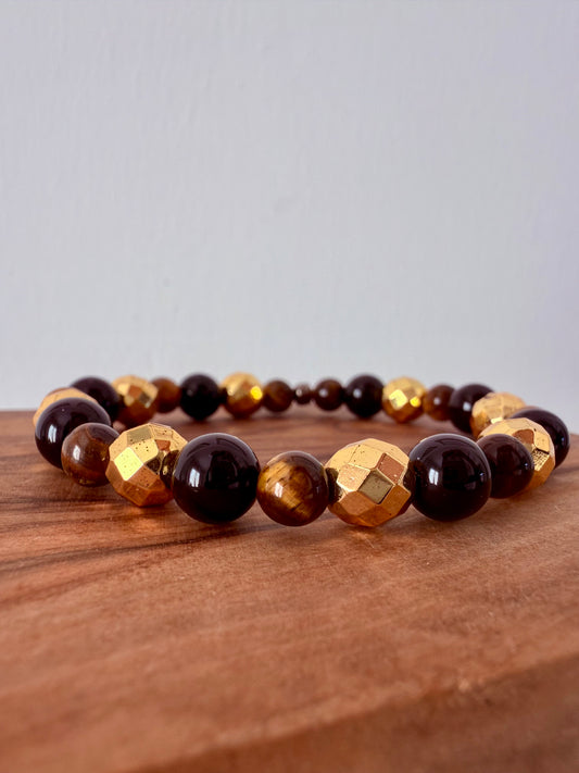 BRACCIALE ELASTICO CON OCCHIO DI TIGRE, EMATITE GOLD E ONICE NERO