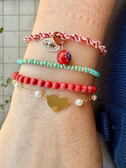 BRACCIALE RADO PERLE CON CUORE IN LINEA