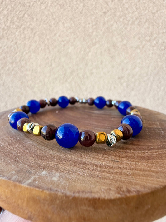 BRACCIALE ELASTICO CON GRANATO, GIADA BLU ED EMATITE BRONZO