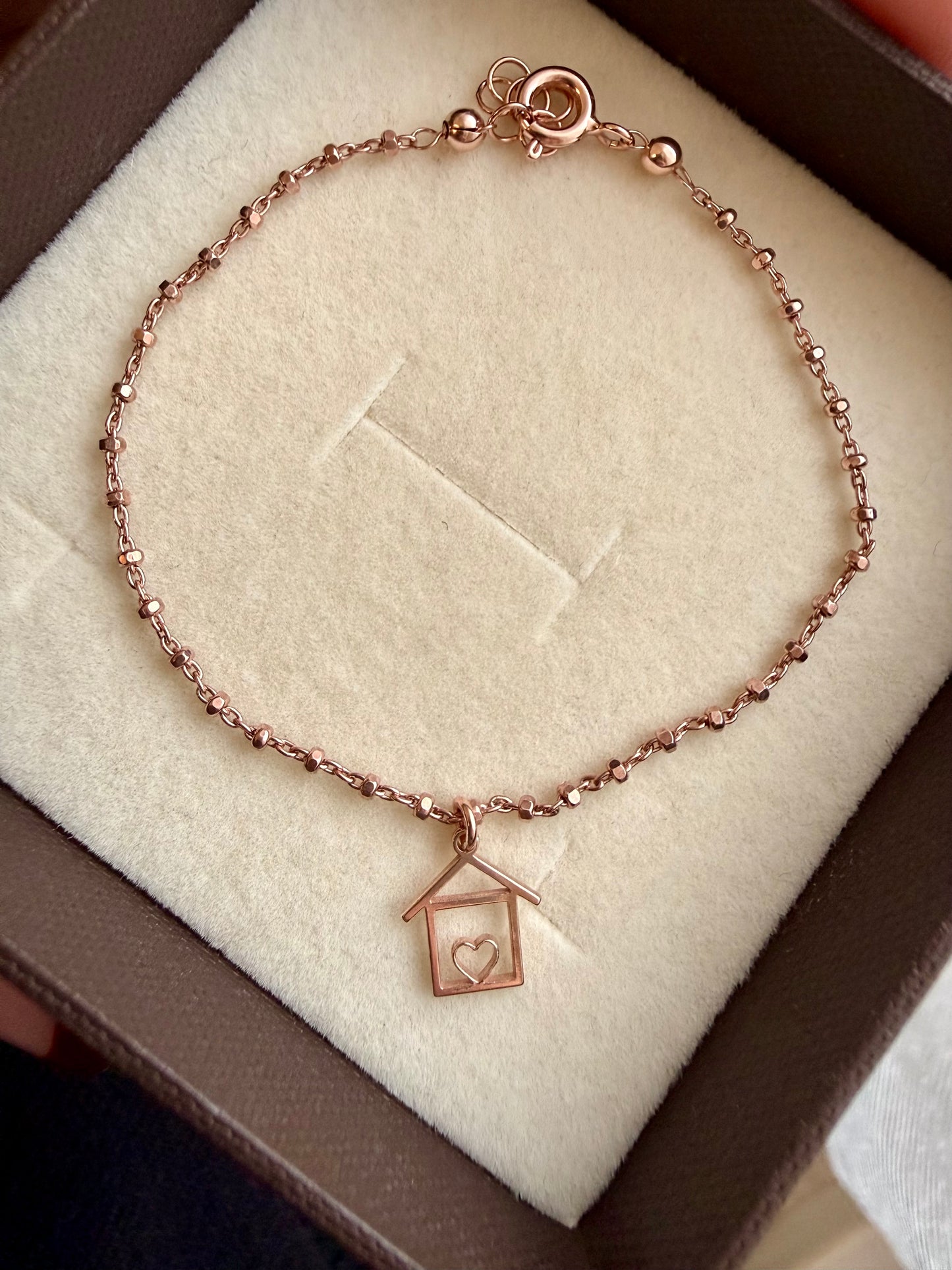 BRACCIALE CATENA RONDELLE DIAMANTATE CON CASETTA PENDENTE