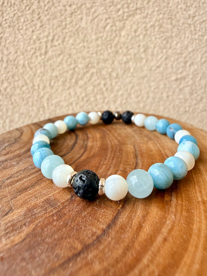 BRACCIALE ELASTICO CON LAVA, MADREPERLA, ACQUAMARINA E QUARZO LARIMAR
