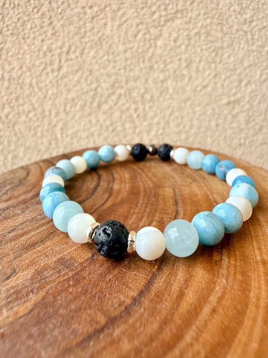 BRACCIALE ELASTICO CON LAVA, MADREPERLA, ACQUAMARINA E QUARZO LARIMAR