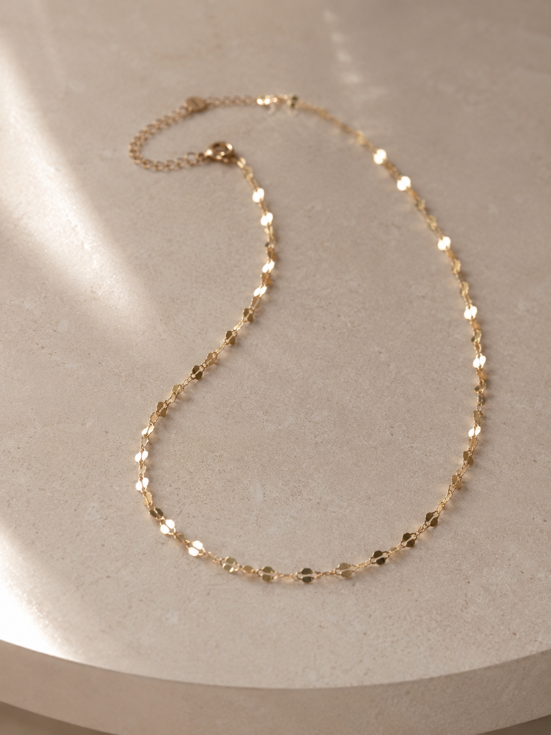 COLLANA CON OVALI PIATTI LAVORATI