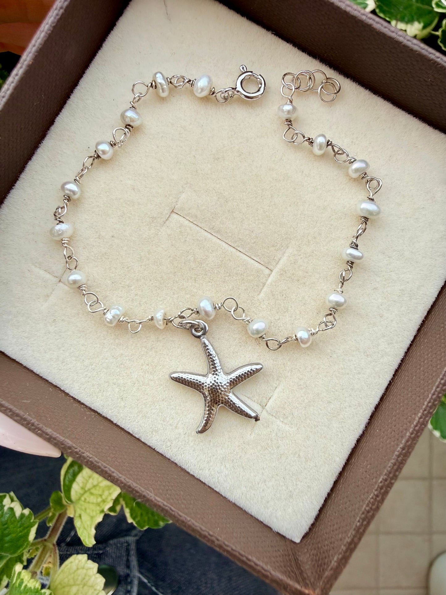 BRACCIALE PERLE E STELLA MARINA