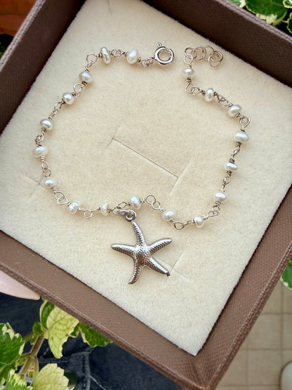 BRACCIALE PERLE E STELLA MARINA