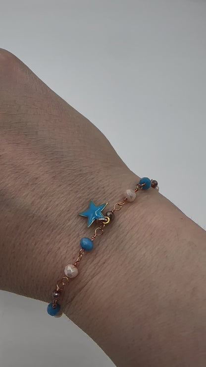 BRACCIALE CRISTALLI AVORIO, AZZURRO E MELANZANA CON STELLINA SMALTATA